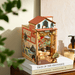 Book Nook Sunset Isle, Bausatz mit Küstenstadt und zwei Lichtstimmungen